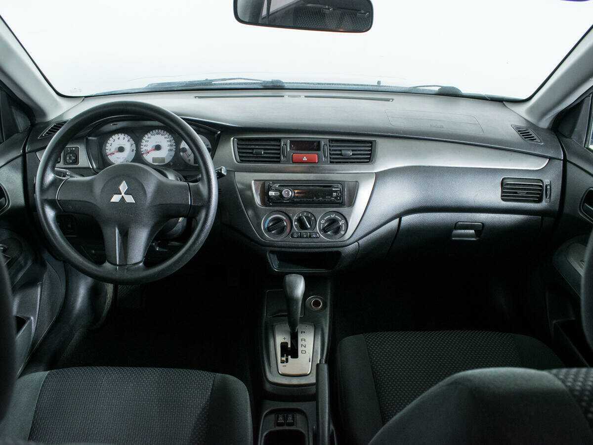 Купить Mitsubishi Lancer с пробегом. Фото: #11