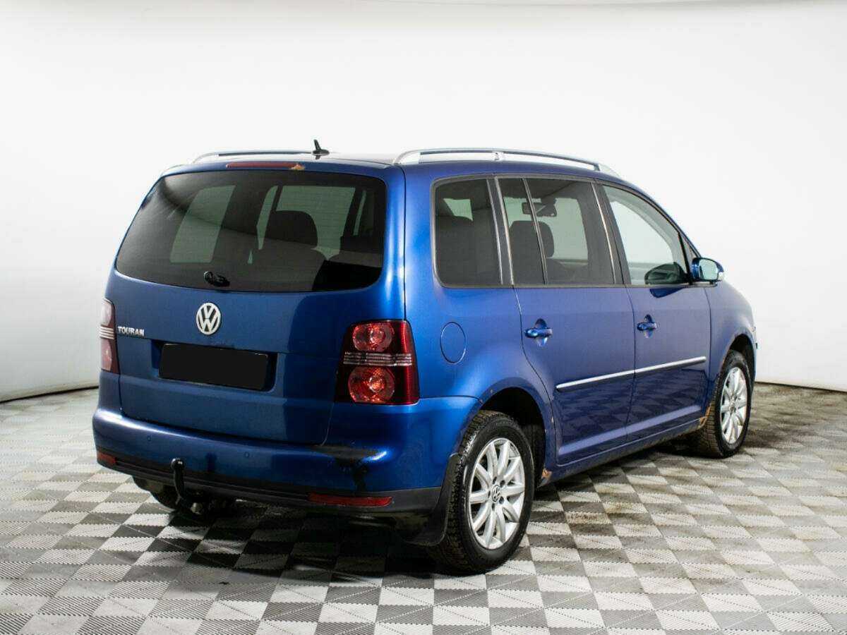 Купить Volkswagen Touran с пробегом. Фото: #4