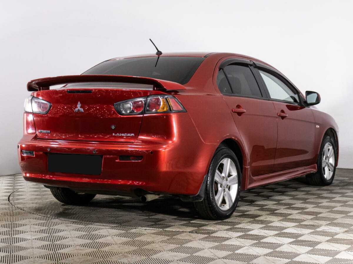 Купить Mitsubishi Lancer с пробегом. Фото: #4