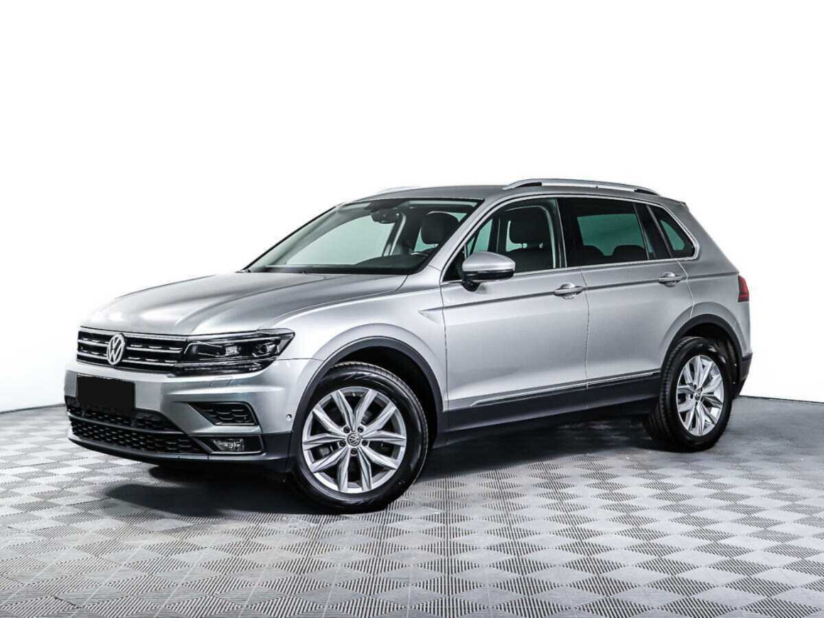 Купить Volkswagen Tiguan с пробегом. Посмотреть фото