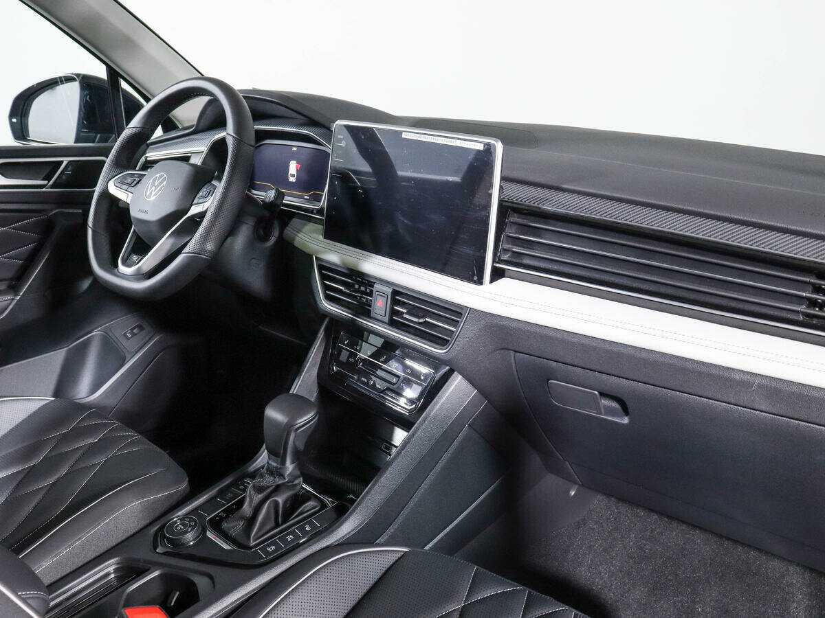 Купить Volkswagen Tiguan с пробегом. Фото: #7