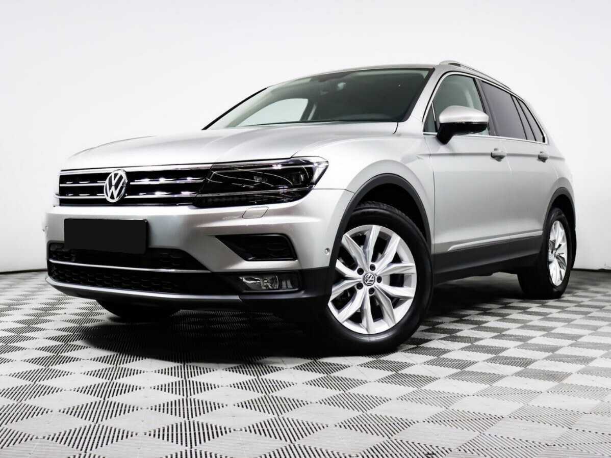 Купить Volkswagen Tiguan с пробегом. Посмотреть фото