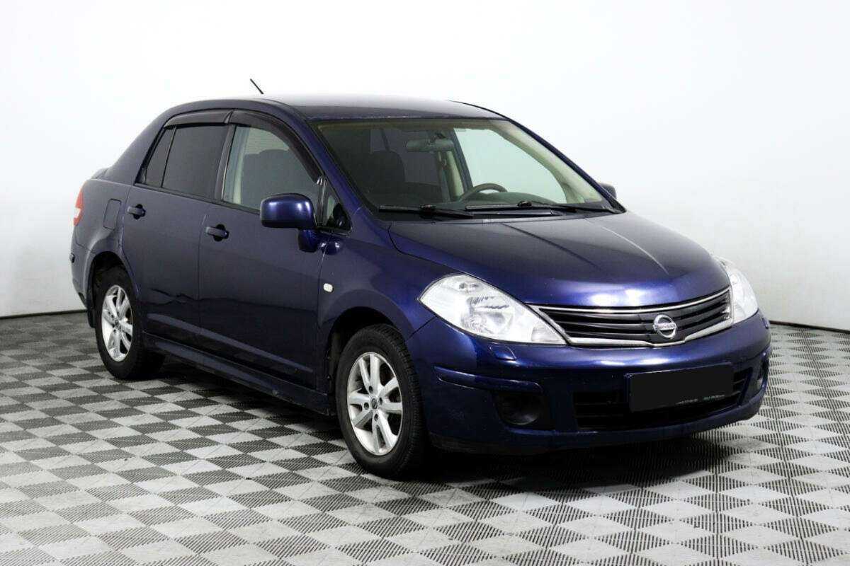 Купить Nissan Tiida с пробегом. Фото: #2