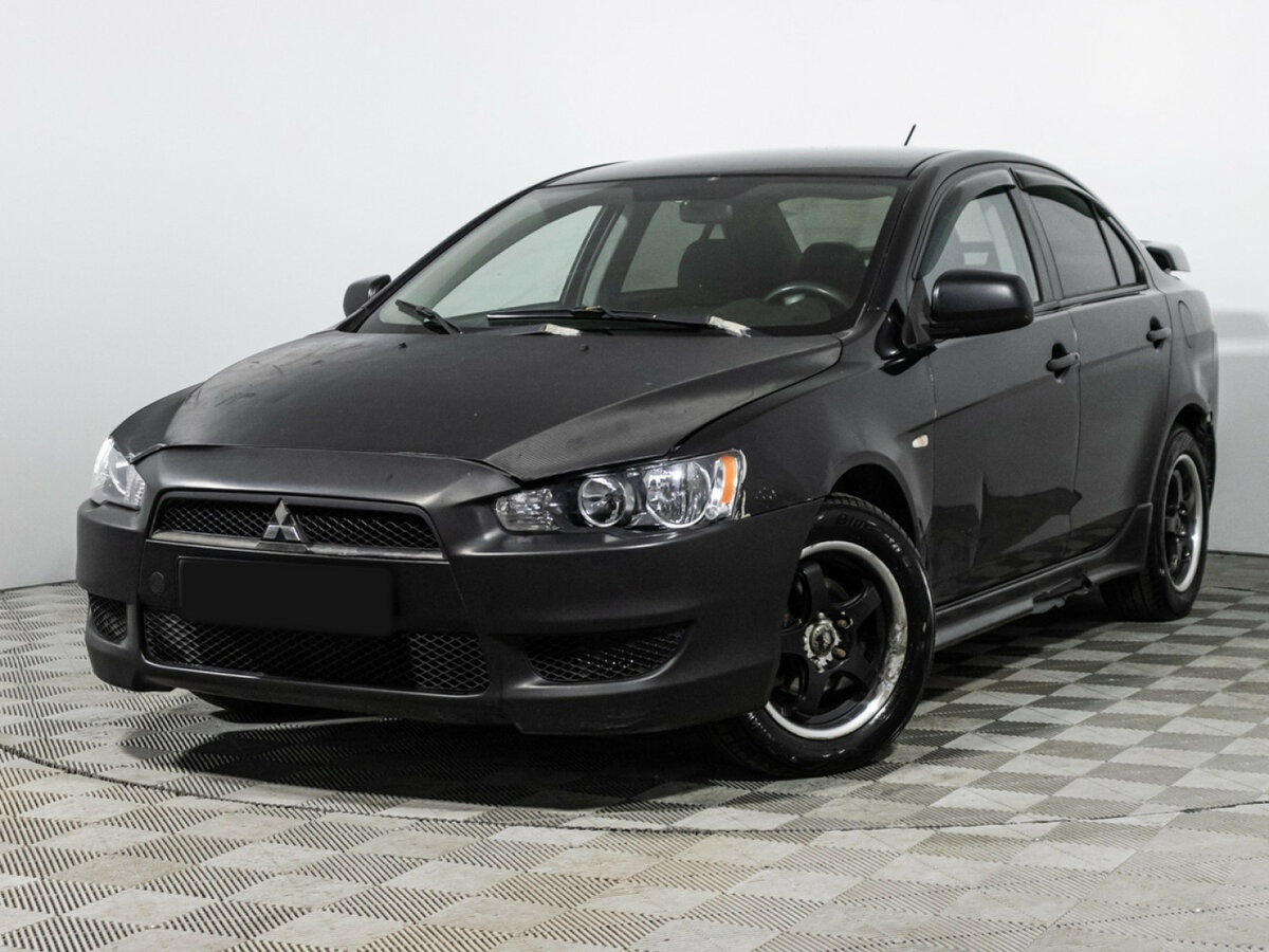 Купить Mitsubishi Lancer с пробегом. Посмотреть фото