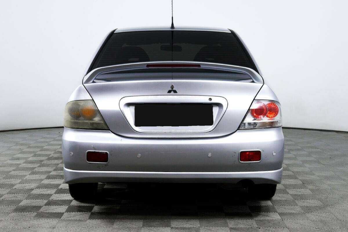 Купить Mitsubishi Lancer с пробегом. Фото: #5