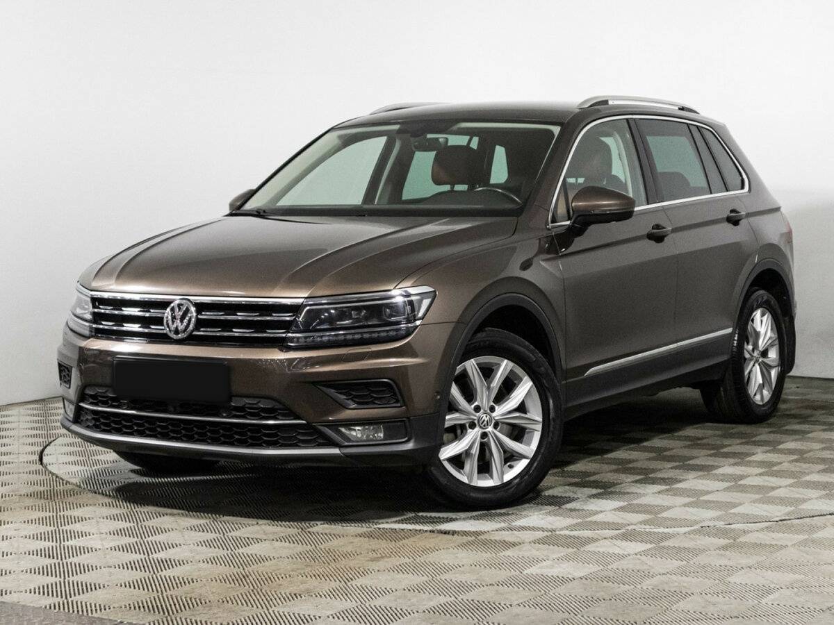 Купить Volkswagen Tiguan с пробегом. Посмотреть фото