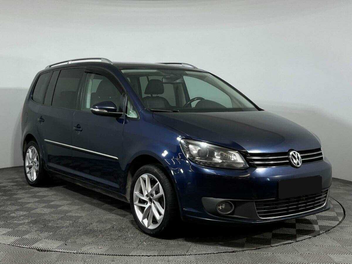 Купить Volkswagen Touran с пробегом. Фото: #2