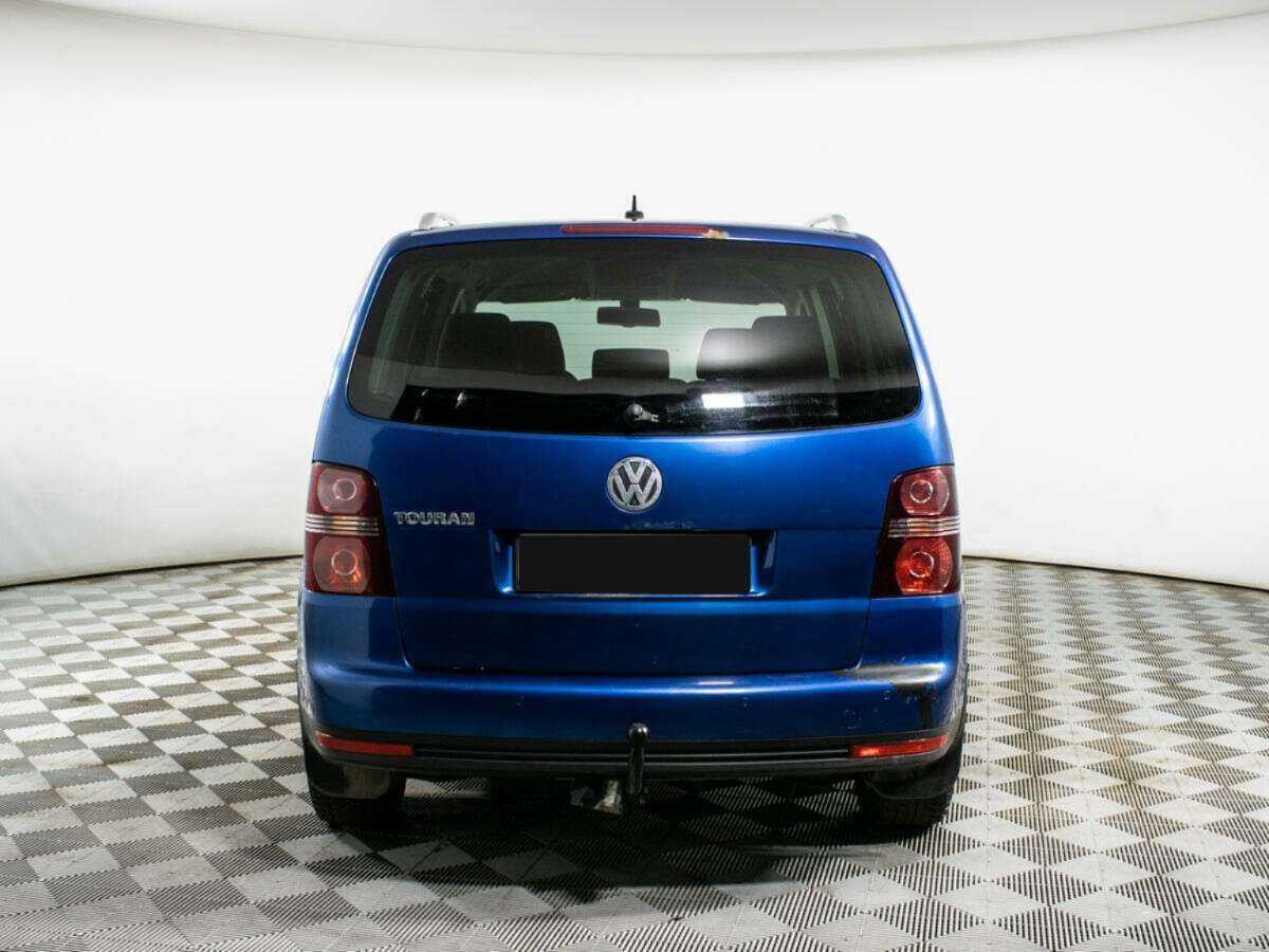 Купить Volkswagen Touran с пробегом. Фото: #5
