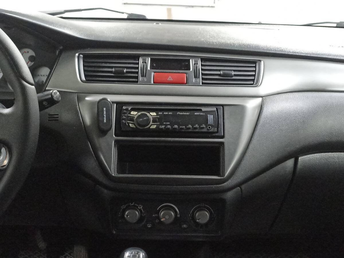 Купить Mitsubishi Lancer с пробегом. Фото: #14