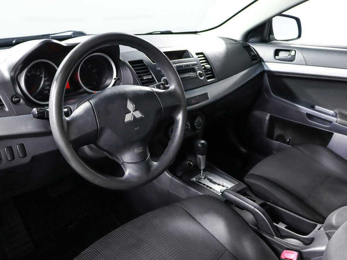 Купить Mitsubishi Lancer с пробегом. Фото: #13
