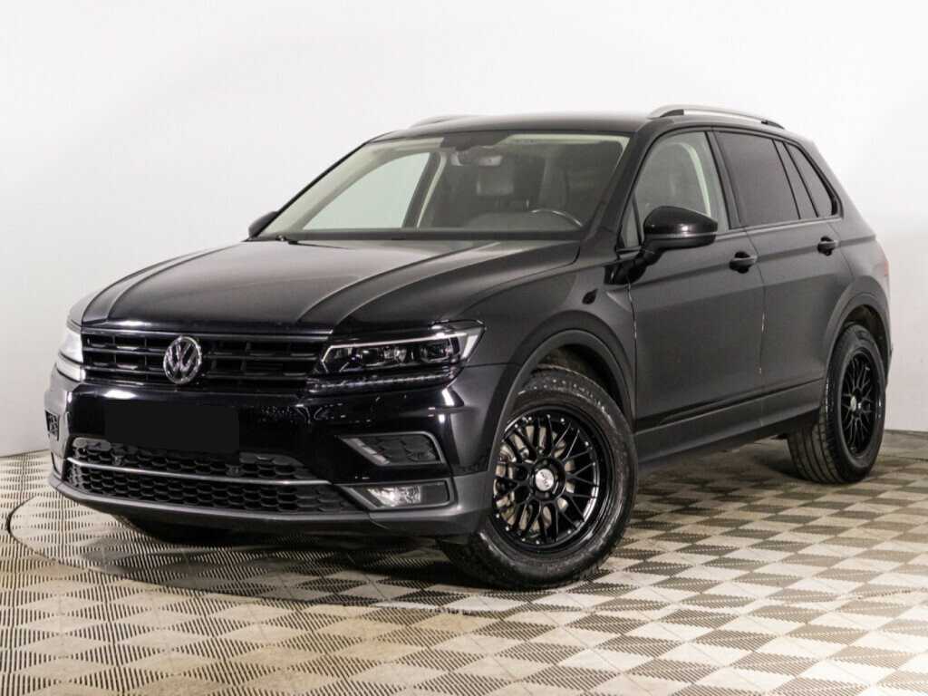 Купить Volkswagen Tiguan с пробегом. Посмотреть фото