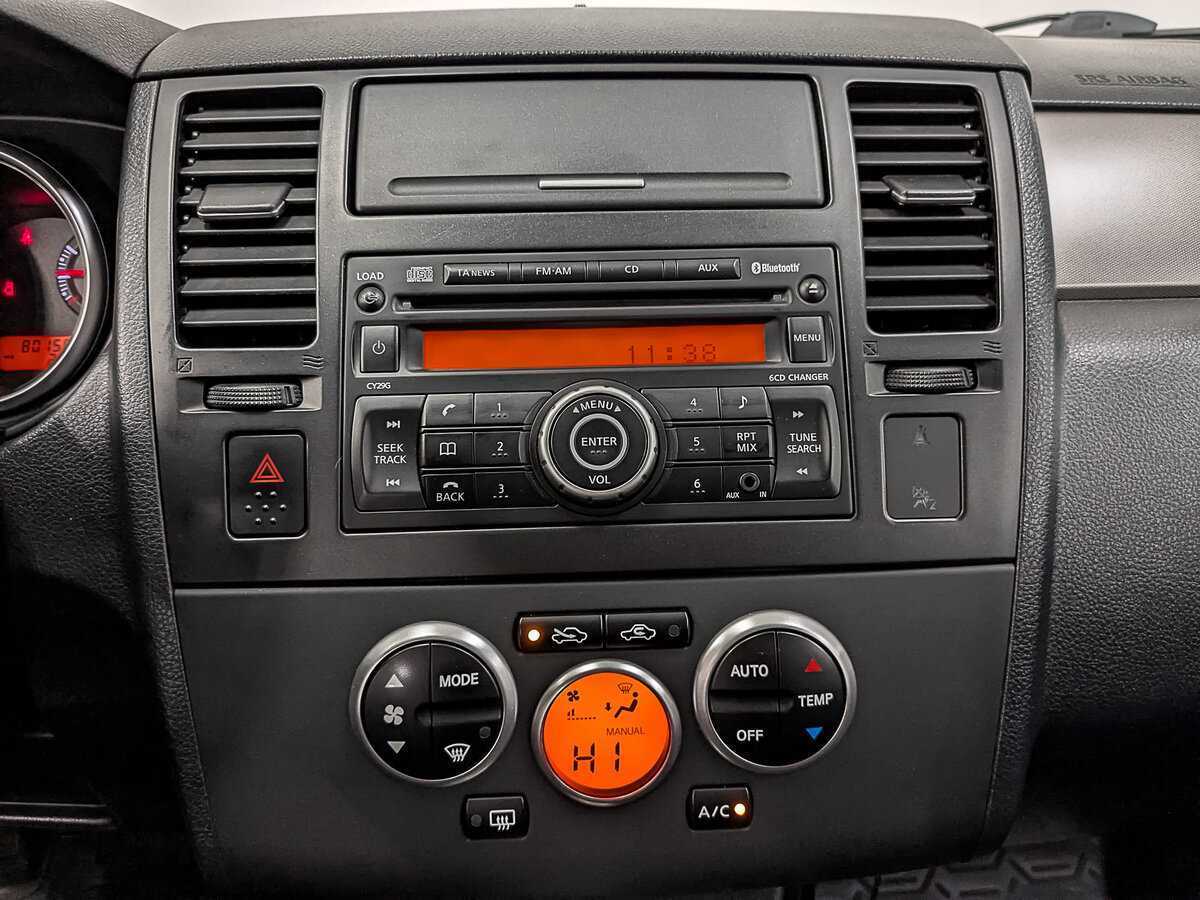 Купить Nissan Tiida с пробегом. Фото: #16