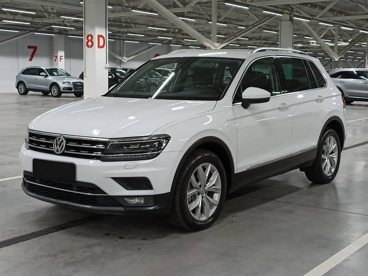 Купить Volkswagen Tiguan с пробегом. Посмотреть фото