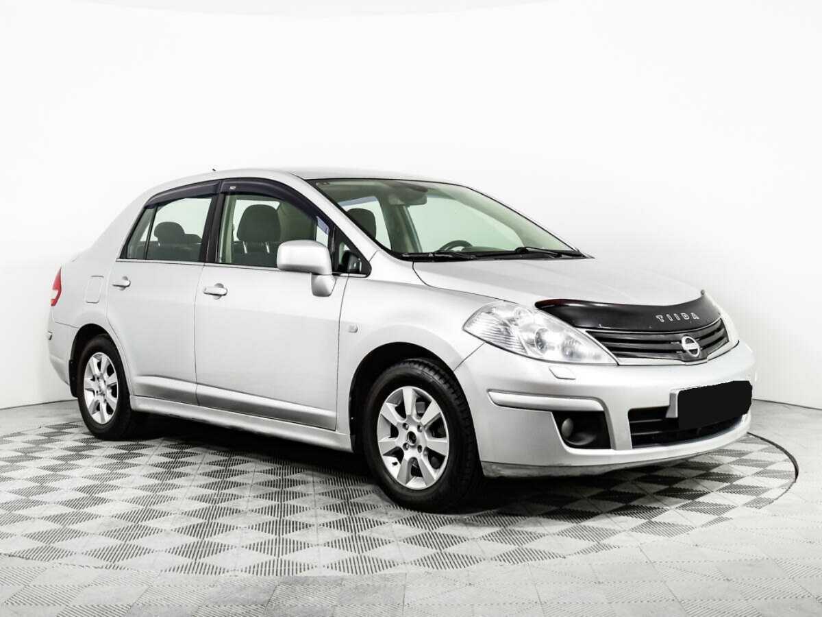 Купить Nissan Tiida с пробегом. Фото: #2