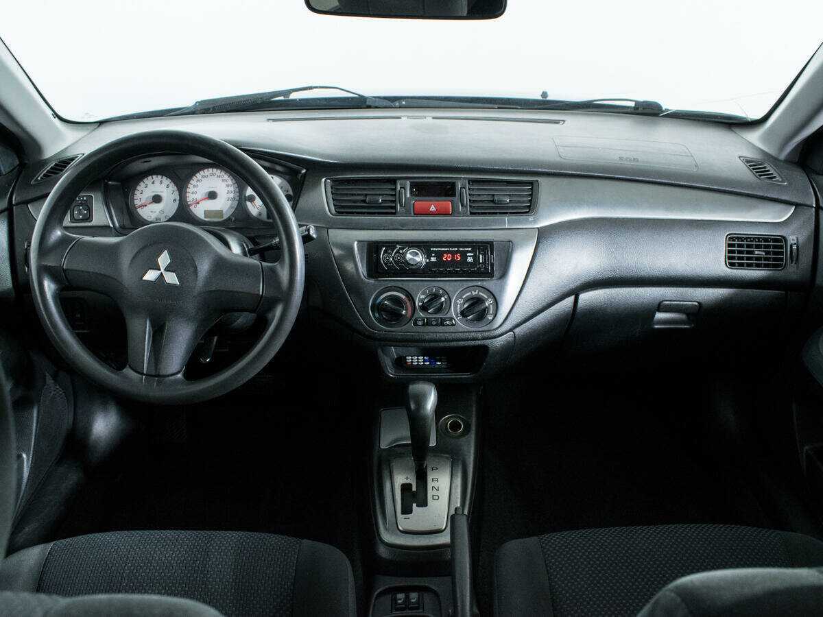 Купить Mitsubishi Lancer с пробегом. Фото: #8