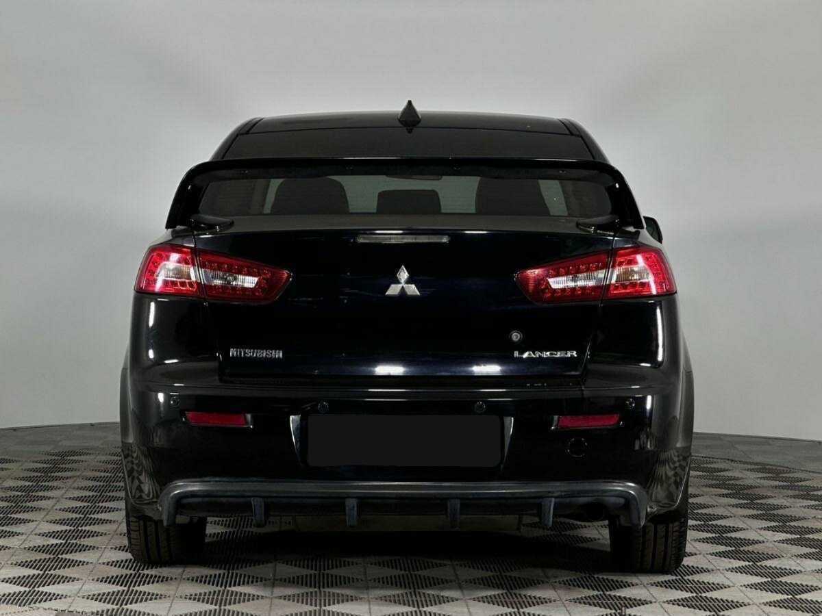 Купить Mitsubishi Lancer с пробегом. Фото: #3
