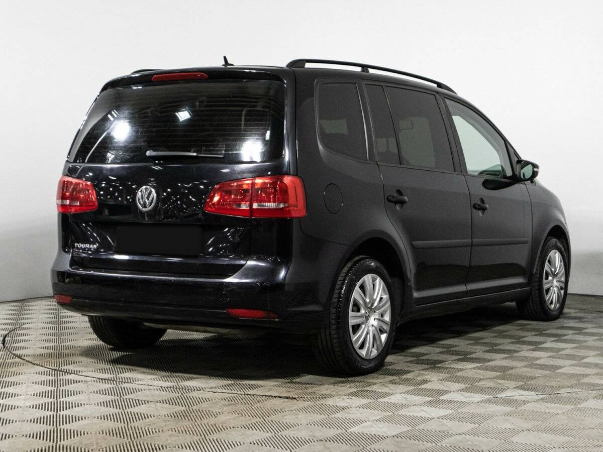 Купить Volkswagen Touran с пробегом. Фото: #4