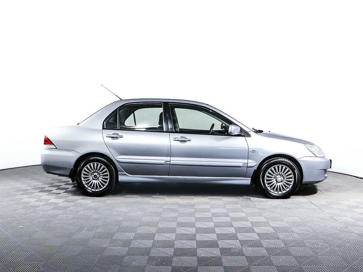 Купить Mitsubishi Lancer с пробегом. Фото: #3