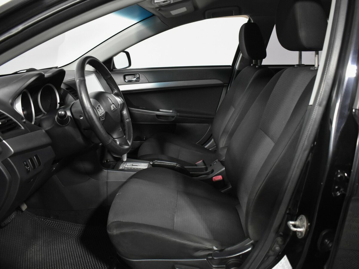 Купить Mitsubishi Lancer с пробегом. Фото: #6