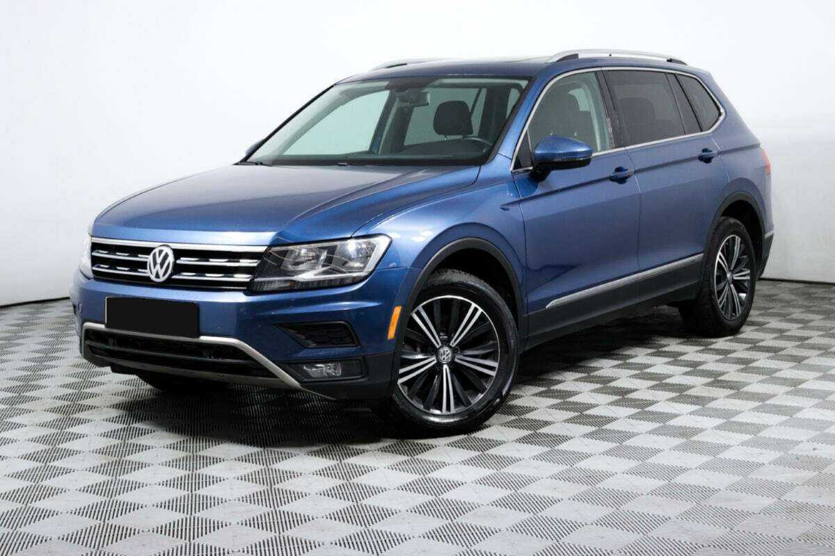 Купить Volkswagen Tiguan с пробегом. Посмотреть фото