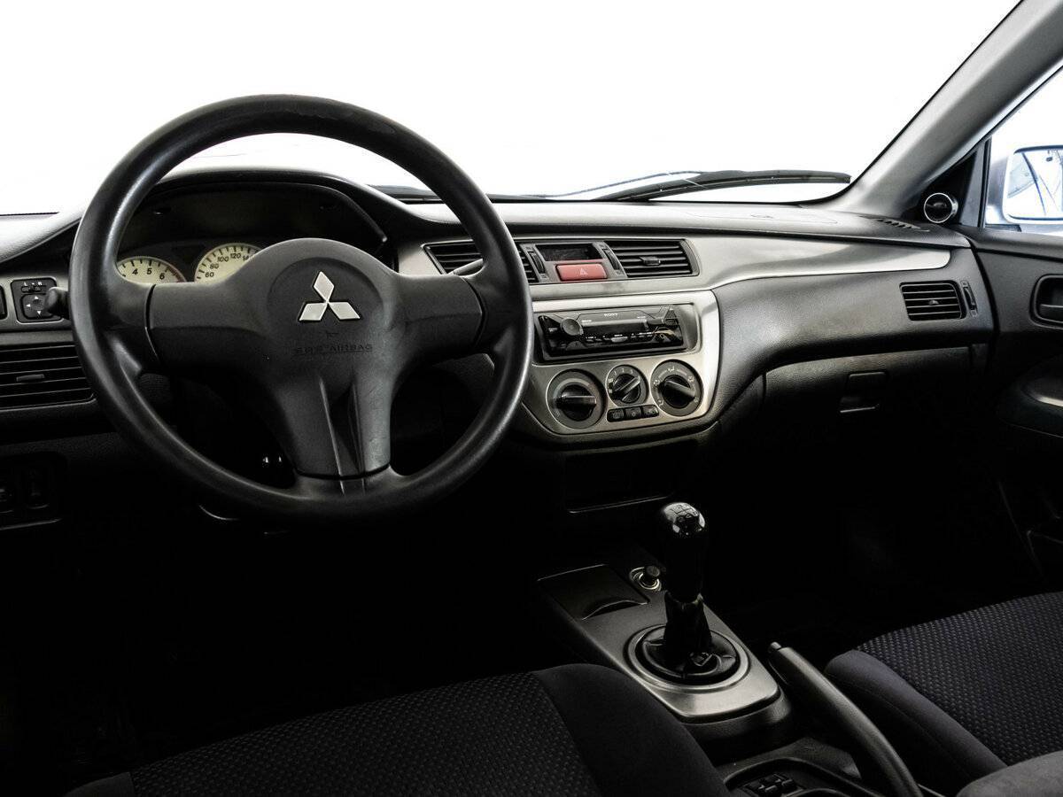 Купить Mitsubishi Lancer с пробегом. Фото: #9