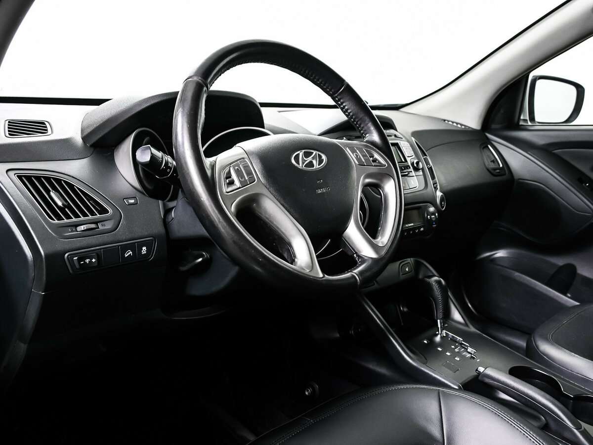 Купить Hyundai ix35 с пробегом. Фото: #11