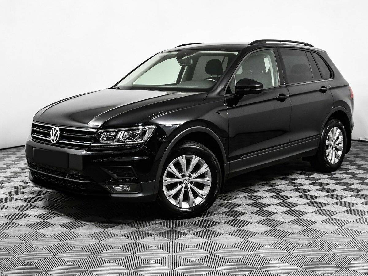 Купить Volkswagen Tiguan с пробегом. Посмотреть фото