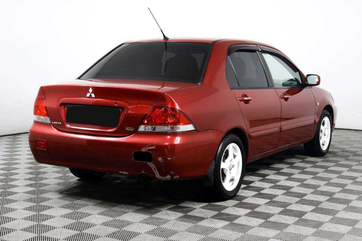 Купить Mitsubishi Lancer с пробегом. Фото: #4