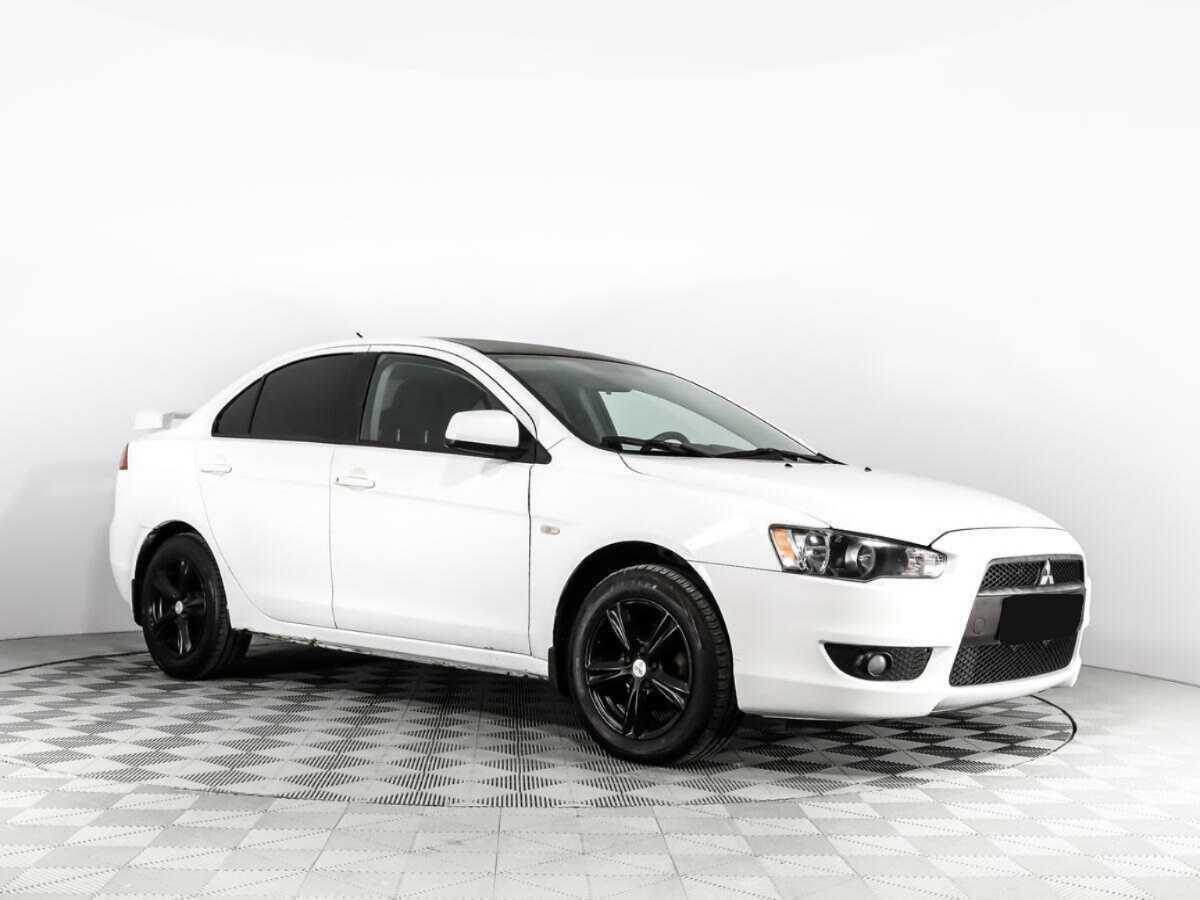 Купить Mitsubishi Lancer с пробегом. Фото: #2