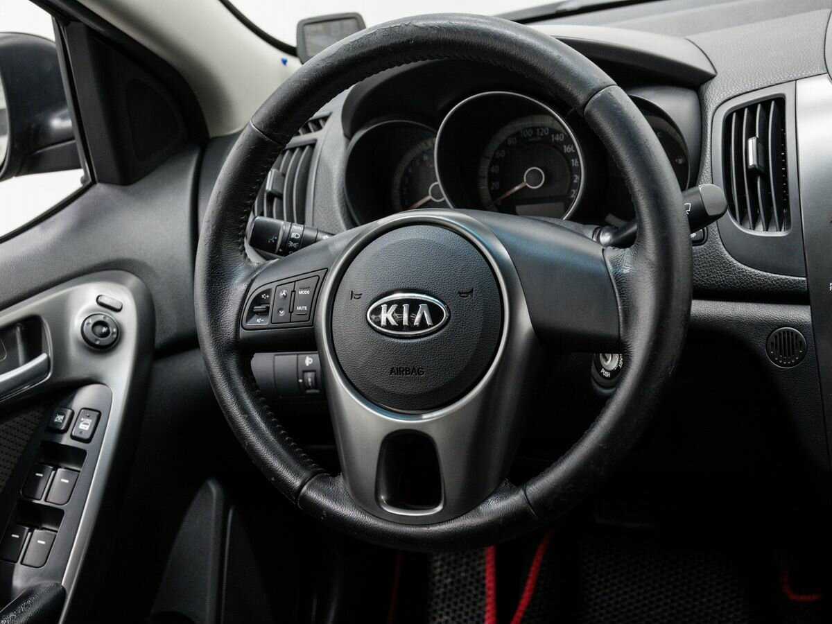Купить Kia Cerato с пробегом. Фото: #11