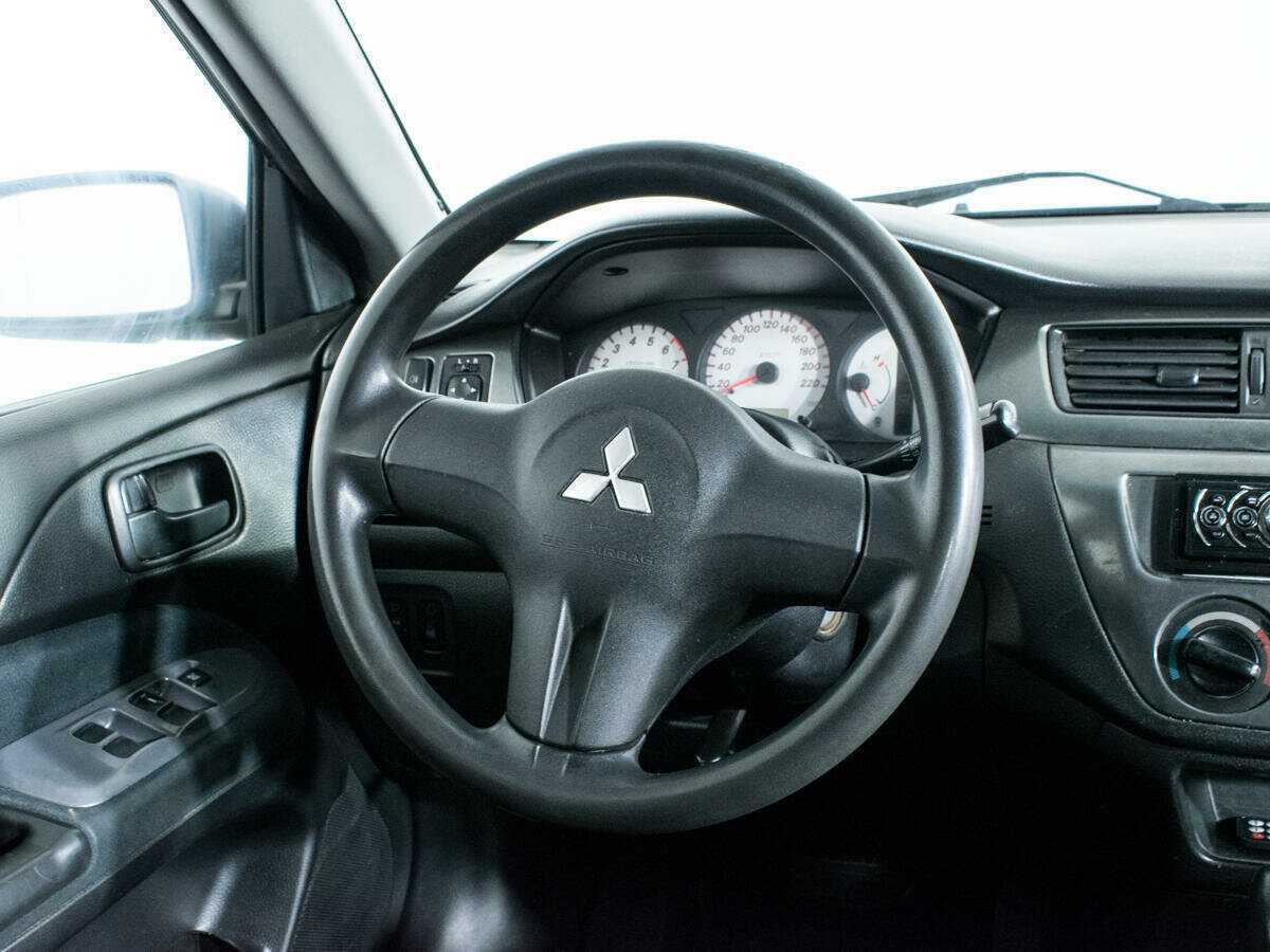 Купить Mitsubishi Lancer с пробегом. Фото: #9