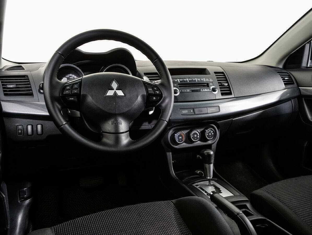 Купить Mitsubishi Lancer с пробегом. Фото: #10