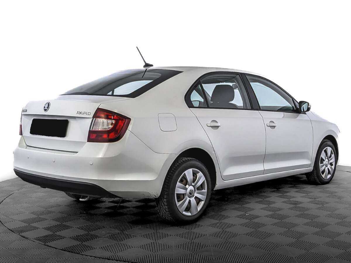 Купить Skoda Rapid с пробегом. Фото: #4