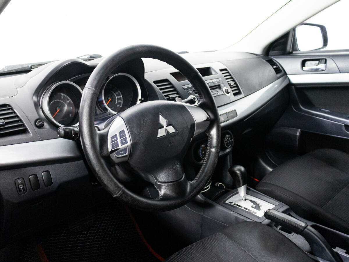 Купить Mitsubishi Lancer с пробегом. Фото: #10