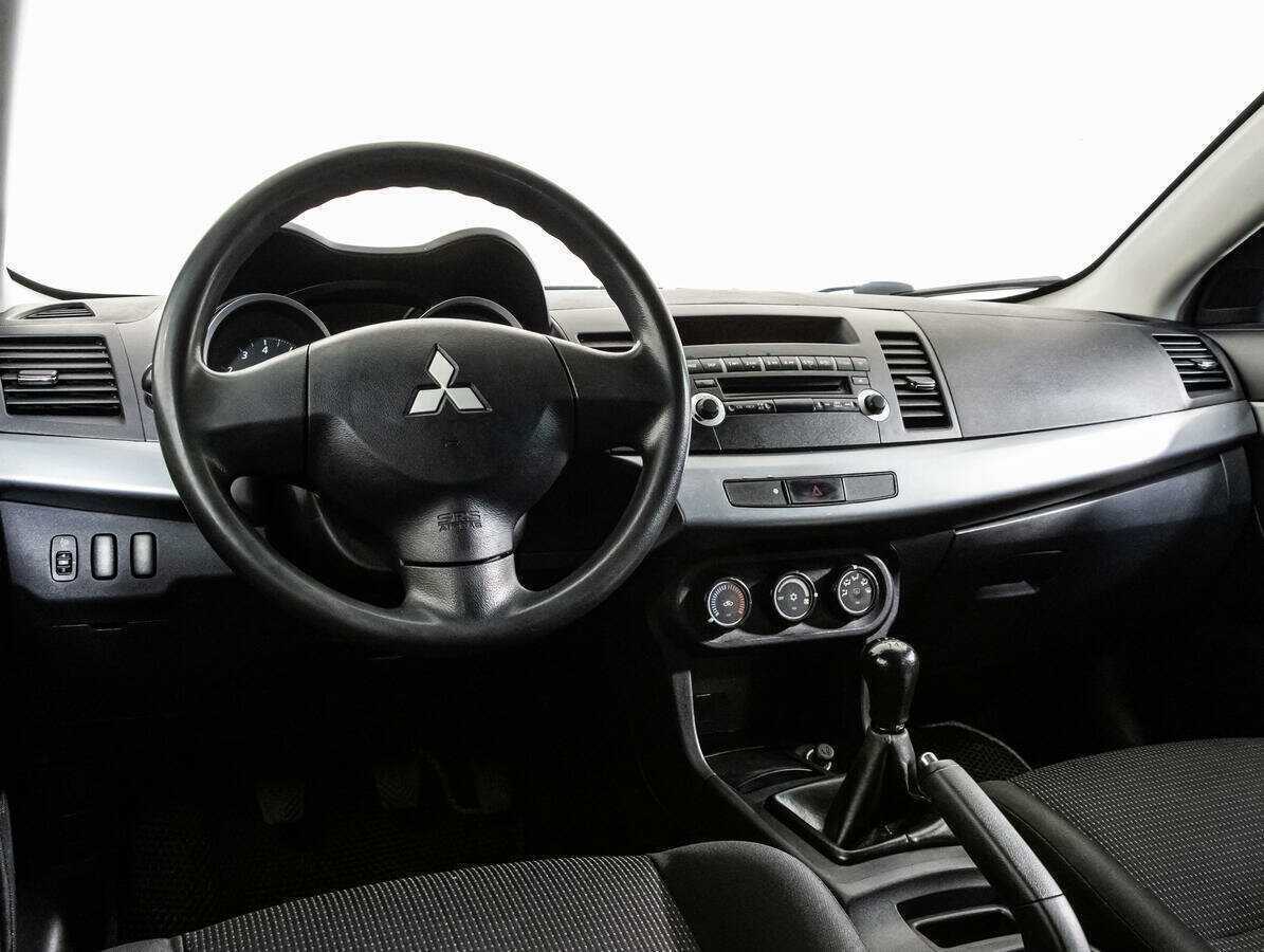 Купить Mitsubishi Lancer с пробегом. Фото: #10