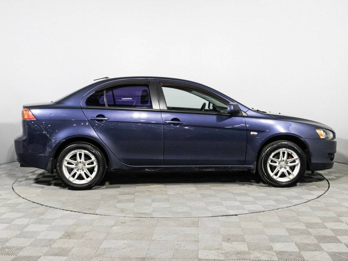 Купить Mitsubishi Lancer с пробегом. Фото: #3