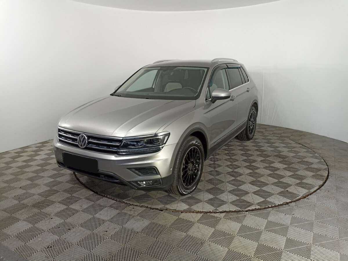 Купить Volkswagen Tiguan с пробегом. Посмотреть фото