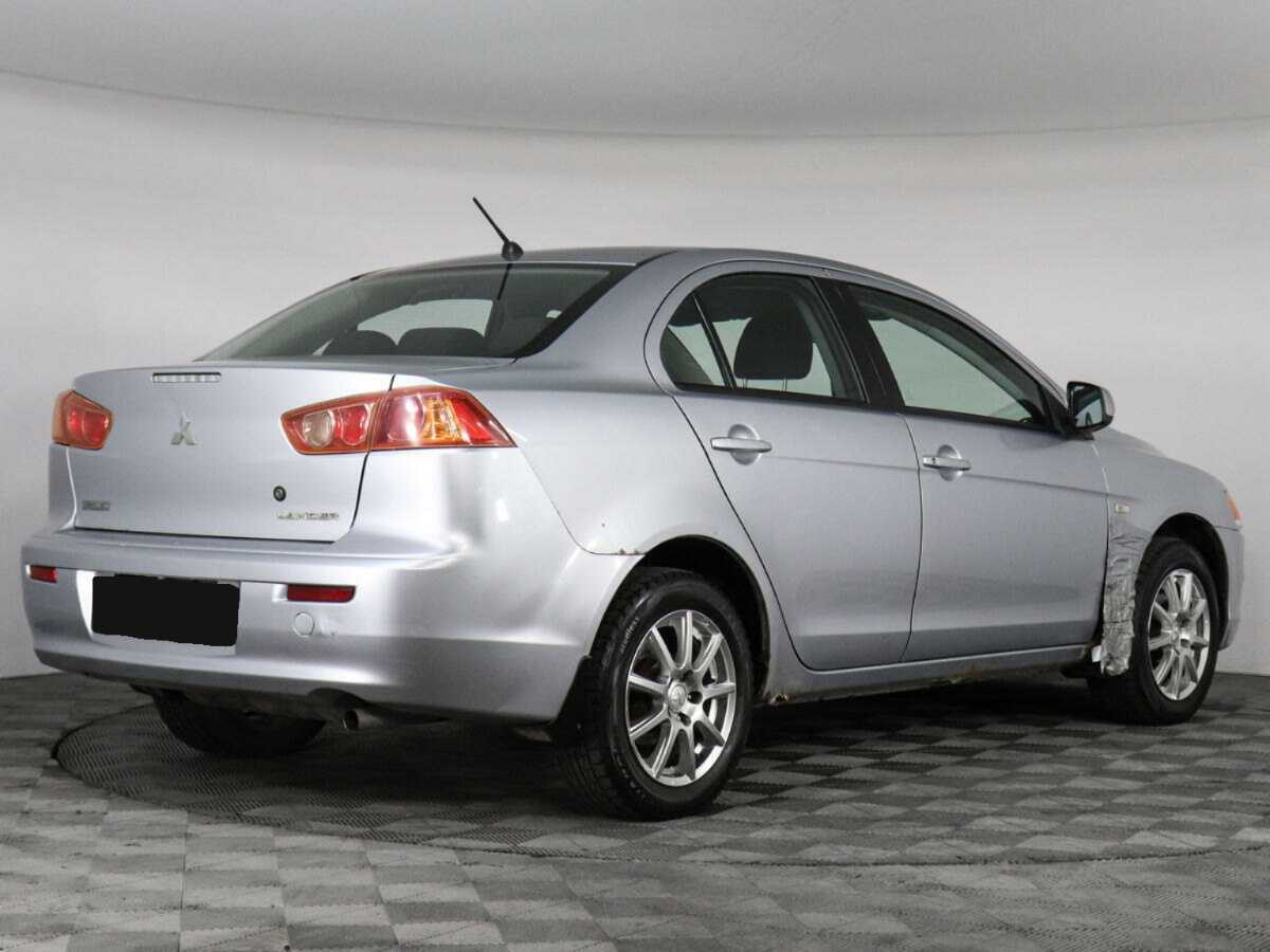 Купить Mitsubishi Lancer с пробегом. Фото: #2