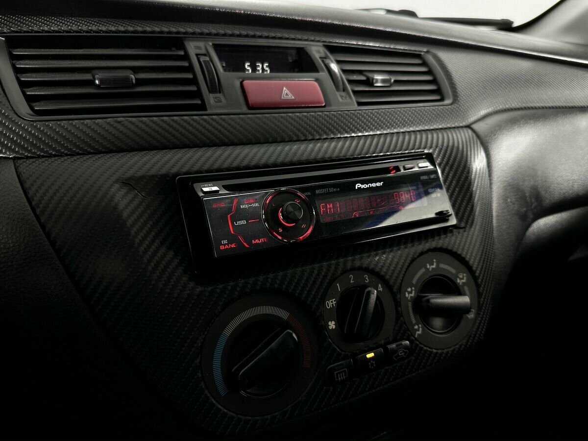 Купить Mitsubishi Lancer с пробегом. Фото: #9