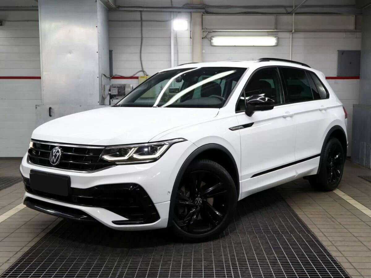 Купить Volkswagen Tiguan с пробегом. Посмотреть фото