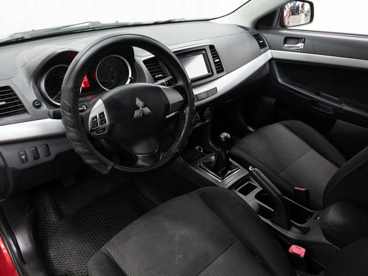 Купить Mitsubishi Lancer с пробегом. Фото: #6