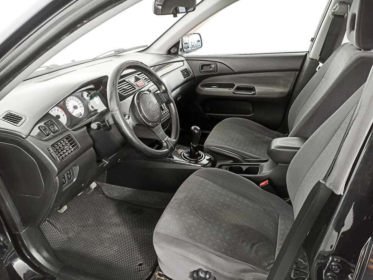 Купить Mitsubishi Lancer с пробегом. Фото: #15