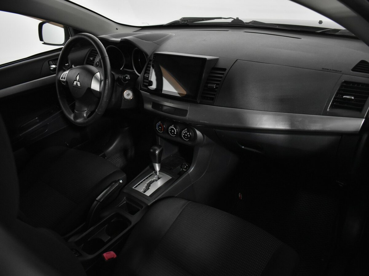 Купить Mitsubishi Lancer с пробегом. Фото: #9