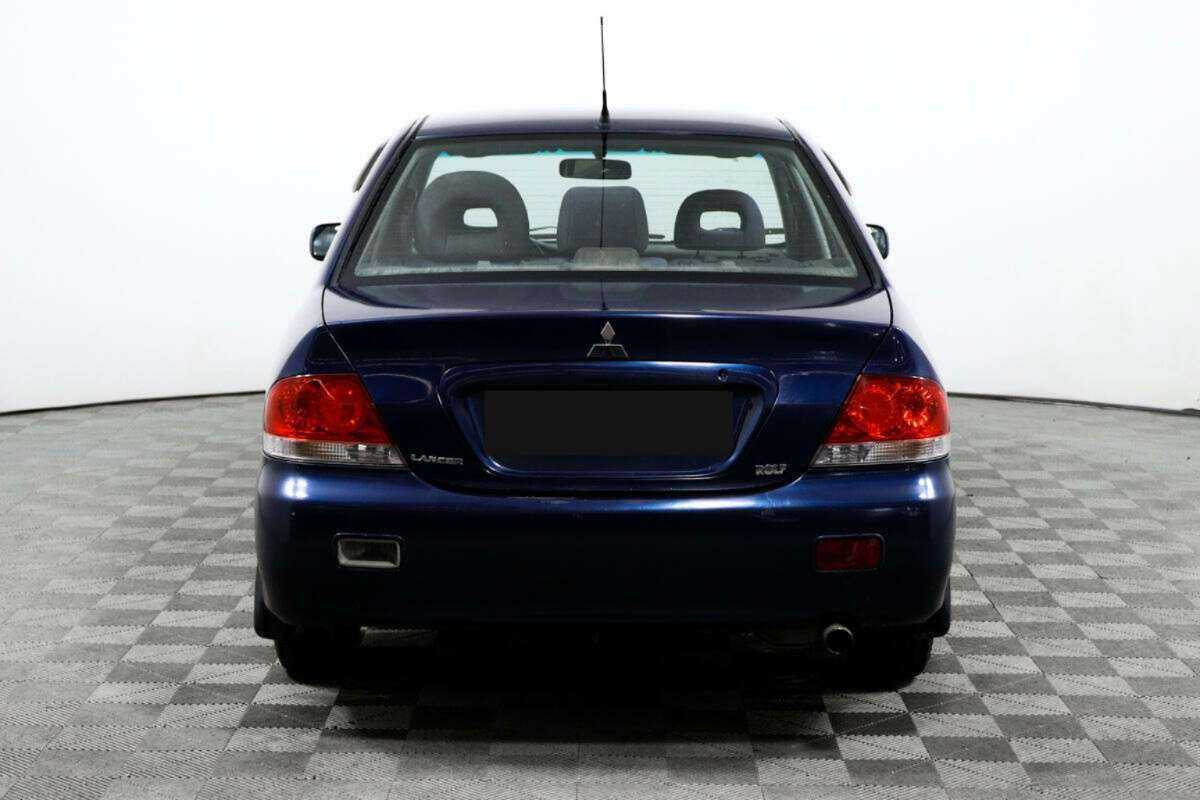 Купить Mitsubishi Lancer с пробегом. Фото: #5