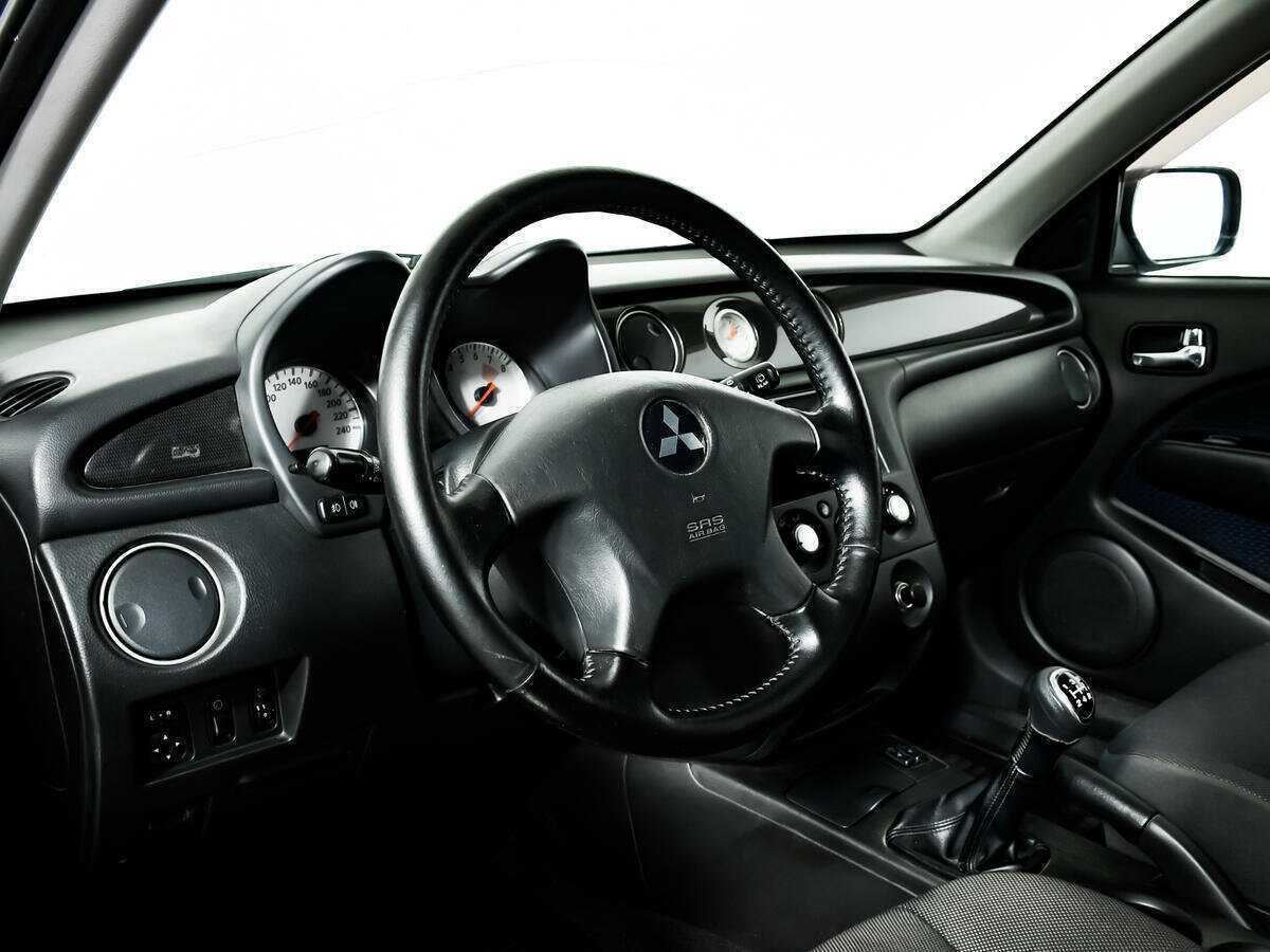 Купить Mitsubishi Outlander с пробегом. Фото: #10