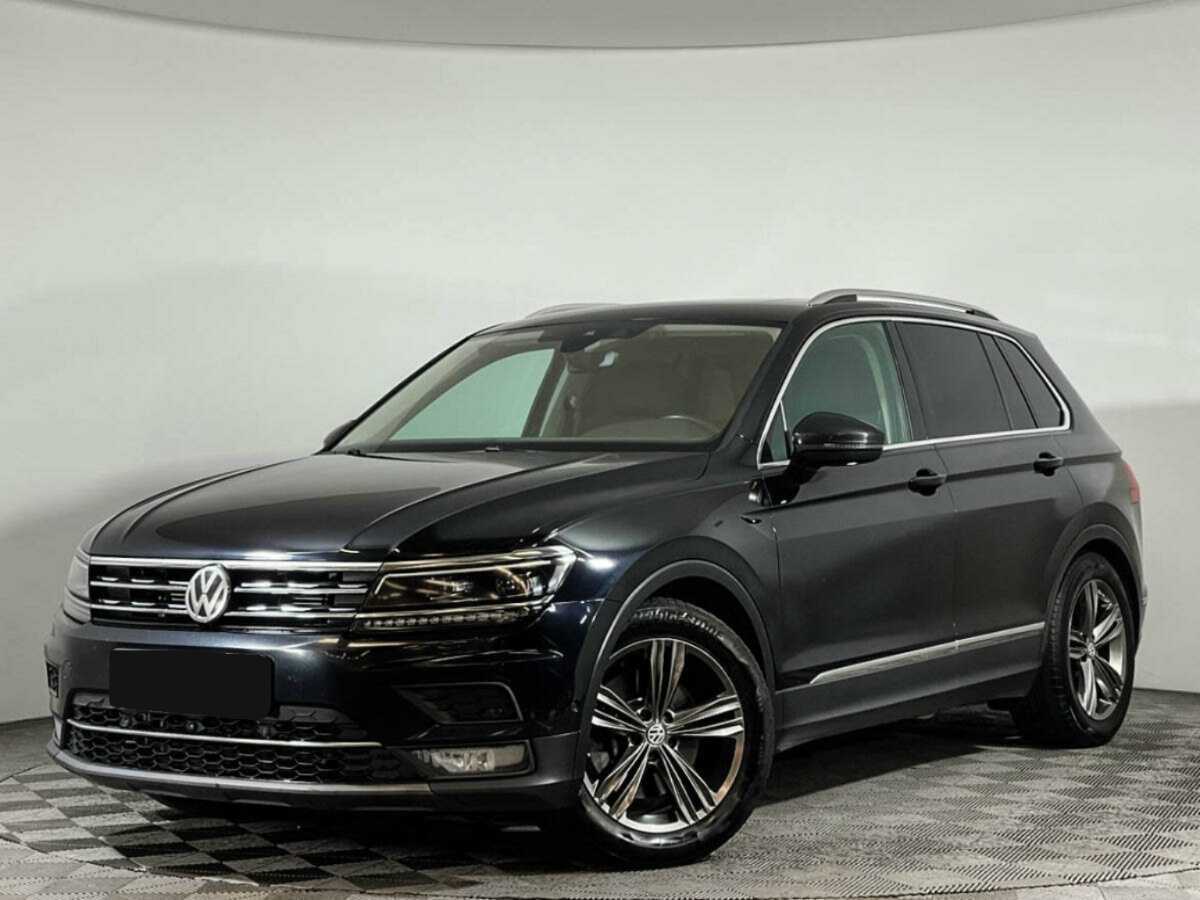 Купить Volkswagen Tiguan с пробегом. Посмотреть фото