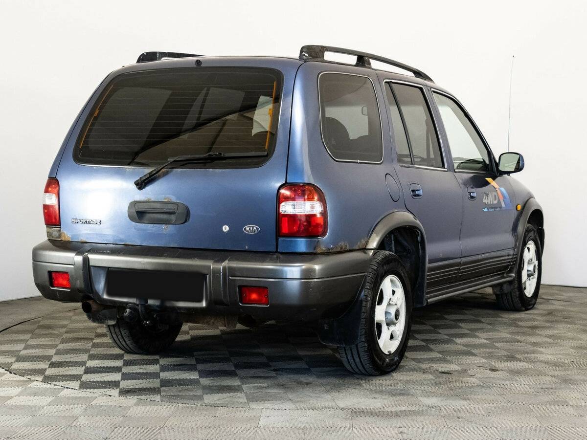 Купить Kia Sportage с пробегом. Фото: #4