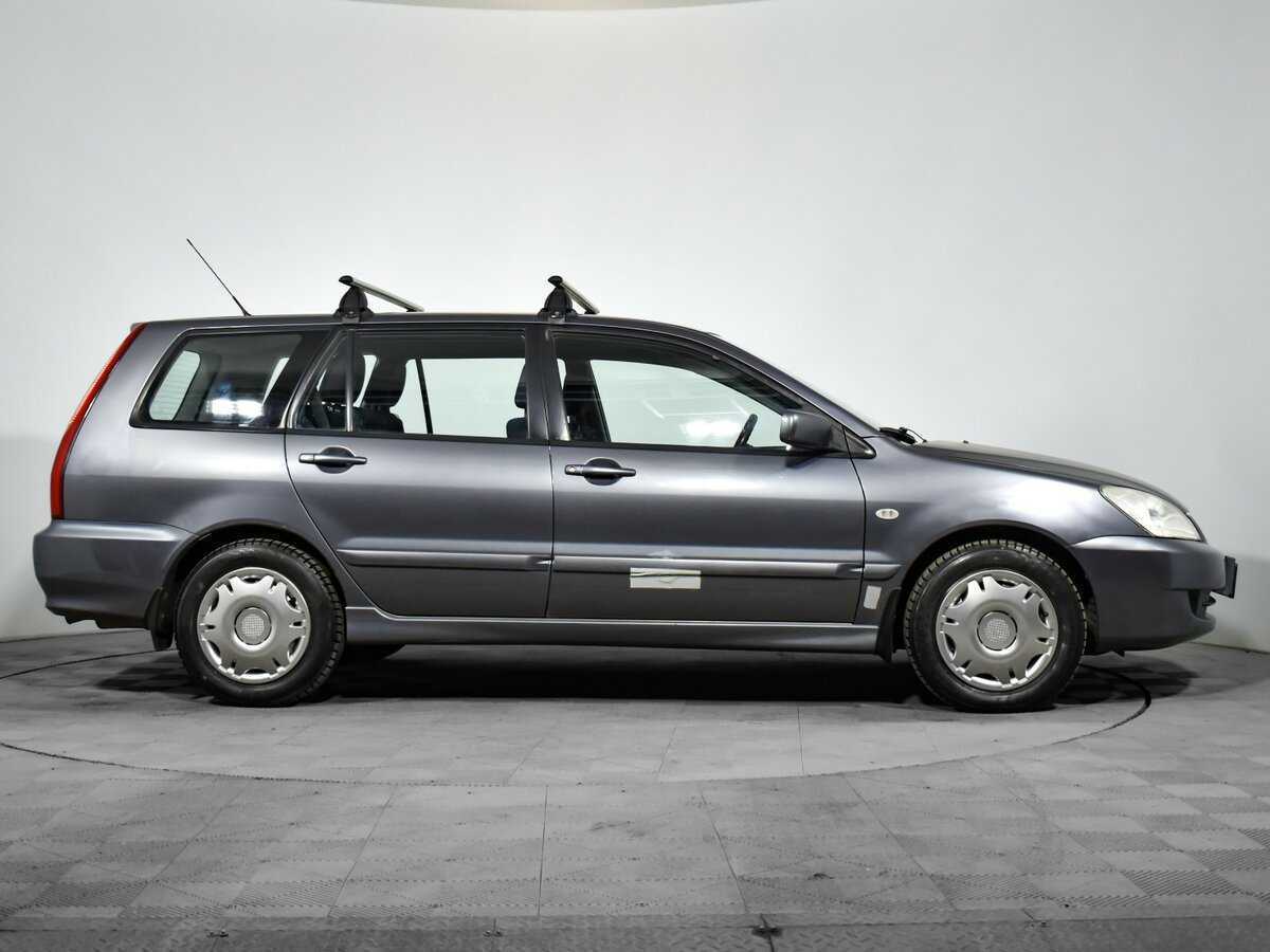 Купить Mitsubishi Lancer с пробегом. Фото: #2