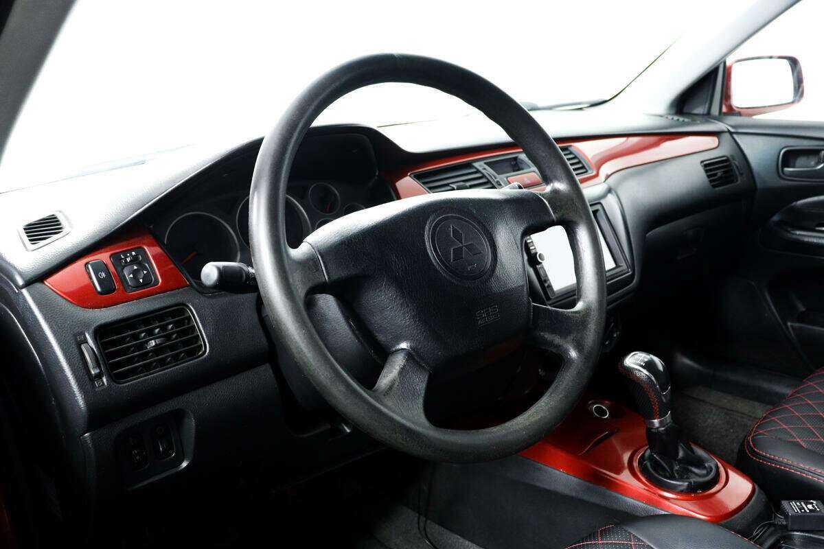 Купить Mitsubishi Lancer с пробегом. Фото: #12