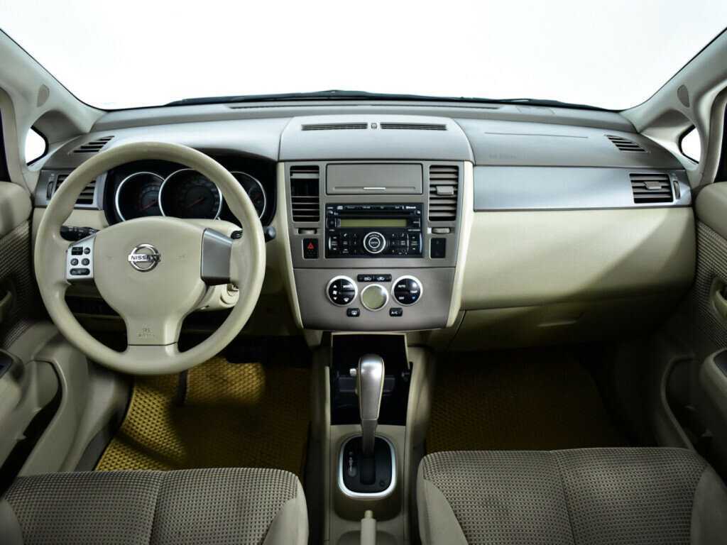 Купить Nissan Tiida с пробегом. Фото: #11